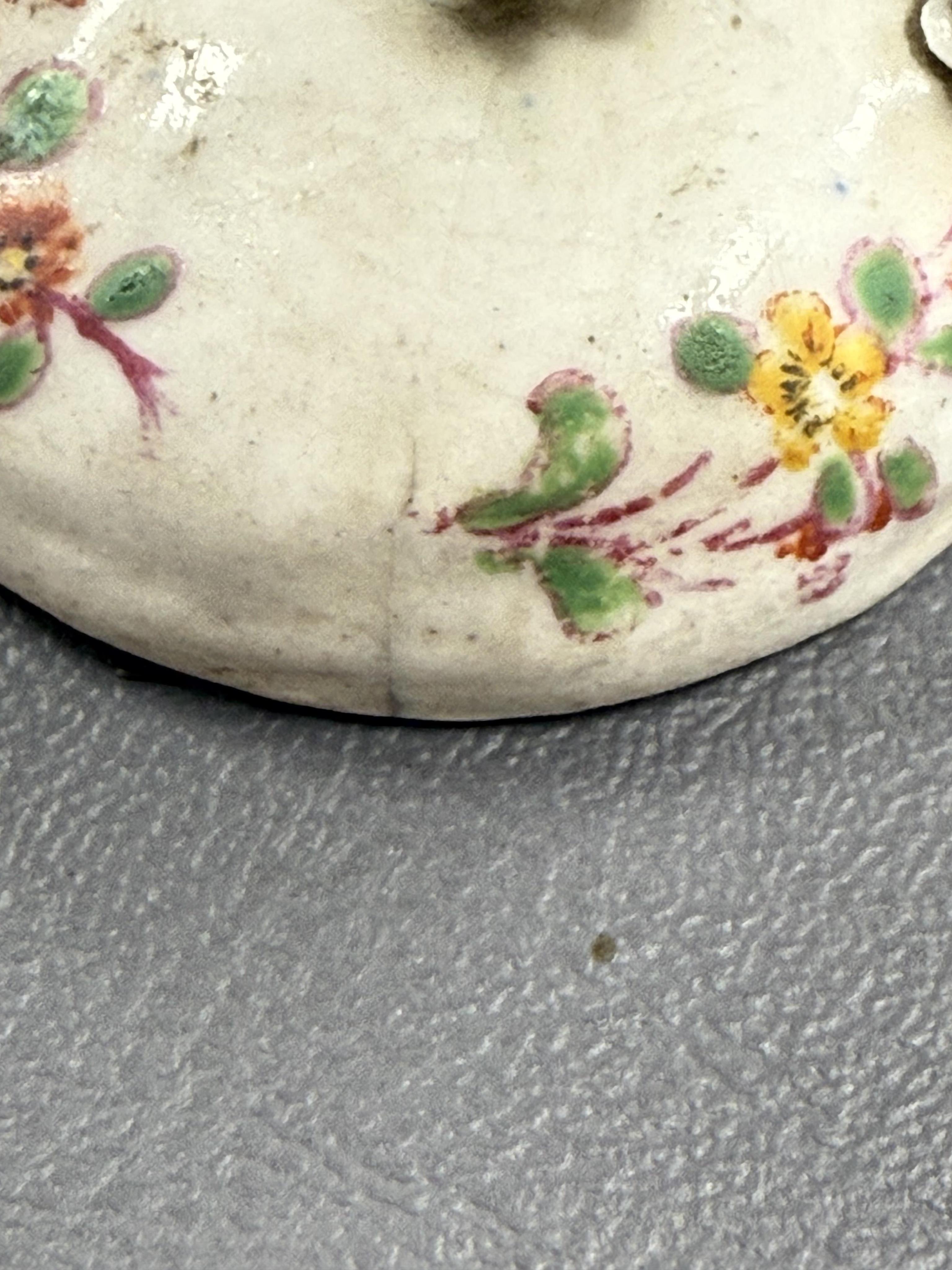 A pair of early Derby porcelain models of wild boars, c.1752-55